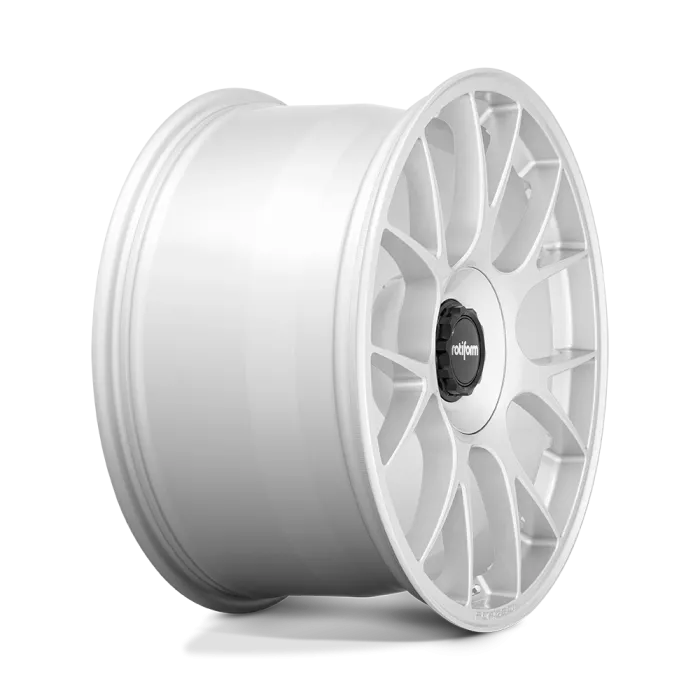 A white multi-spoke alloy car wheel with "rotiform" labeled in the center, set against a plain, light background.