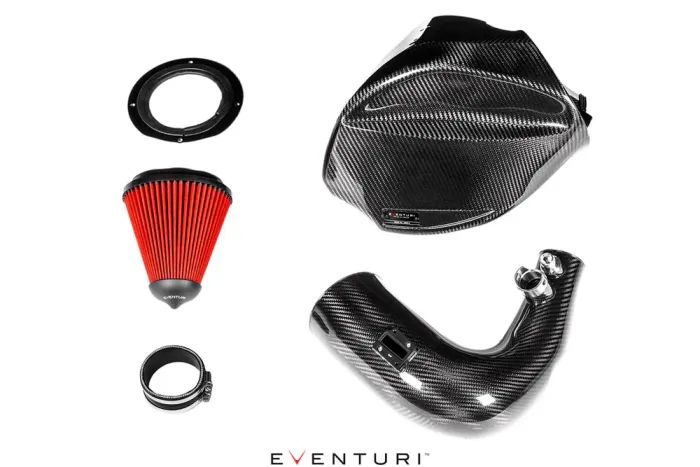 Car engine parts including red conical air filter, black carbon fiber airbox, black carbon fiber intake pipe, ring clamp, and gasket arranged on a white background. Text: "EVENTURI".