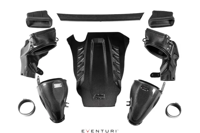 Carbon fiber automotive intake components arranged on a white background, including ducts, shields, and pipes. Below the parts, the text shows "EVENTURI™".