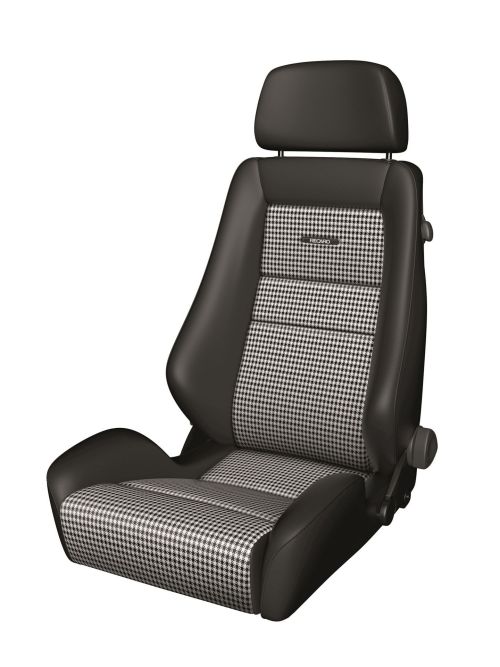 A black car seat with houndstooth fabric inserts and an integrated headrest is set against a plain white background. The seat features the word "RECARO" embroidered on the backrest.