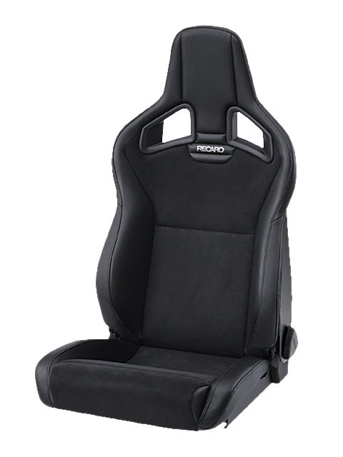 A black, padded racing seat with "RECARO" branding, featuring high sides and cutouts near the headrest, positioned in an isolated, white background.