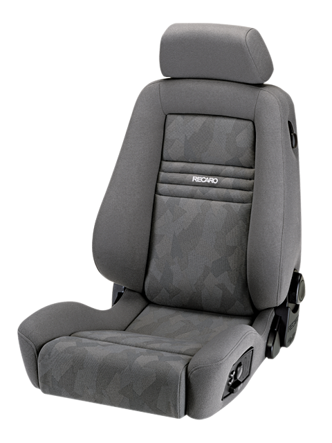 A grey, fabric-covered RECARO car seat with adjustable headrest and side supports, set on a white background.