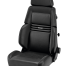 A black automotive seat features "RECARO" text on the backrest, with an adjustable headrest, contoured side supports, and adjustment knobs, set against a white background.