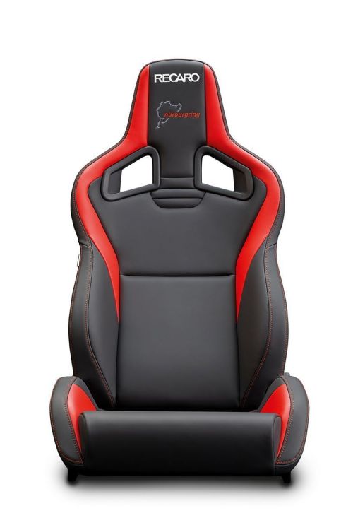 A black and red racing car seat, with the text "RECARO Nürburgring" embroidered on the headrest, positioned against a plain white background.