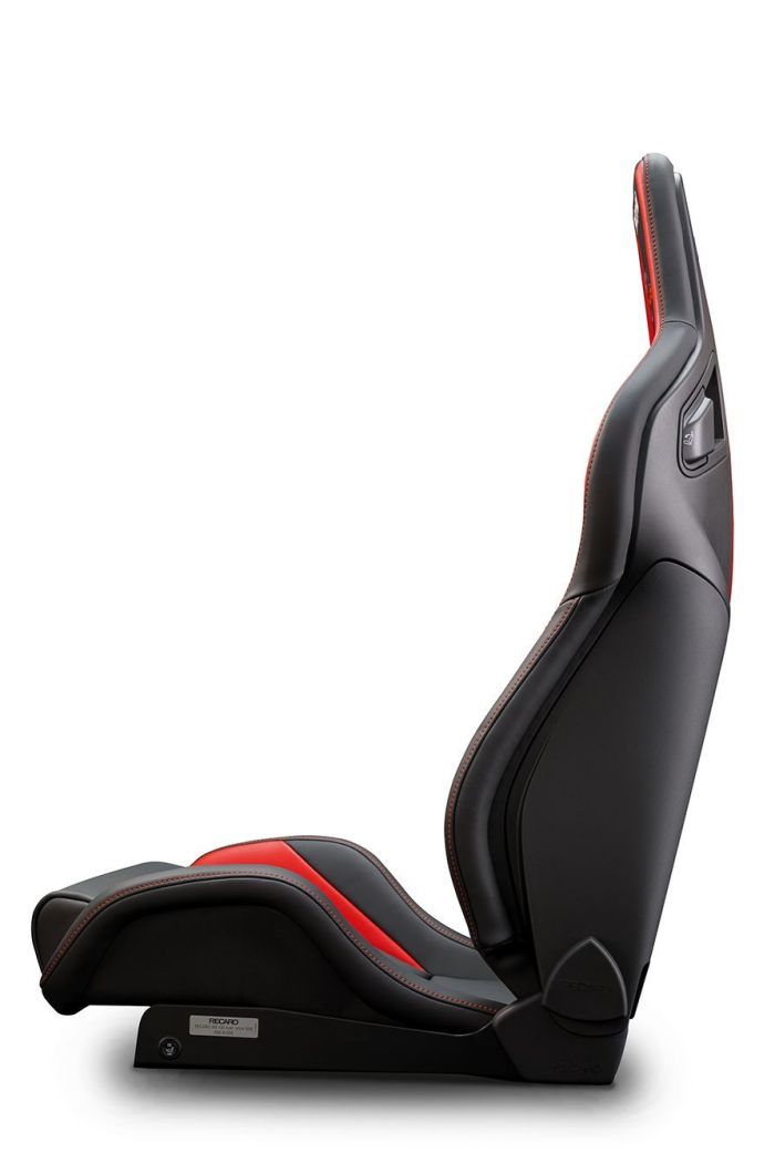 A black and red leather car seat with ergonomic contours and visible stitching is positioned against a white background. Text on the seat reads: "RECARO MADE IN GERMANY Model: CROSS SPORTSTER."