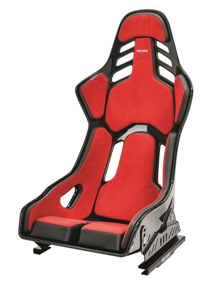 A red and black racing seat with the brand name "Recaro" is displayed upright against a plain white background.