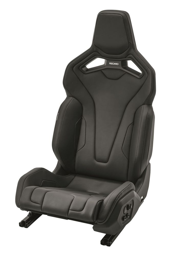 A black, ergonomic car seat labeled "RECARO" with adjustable settings is positioned on a white background.