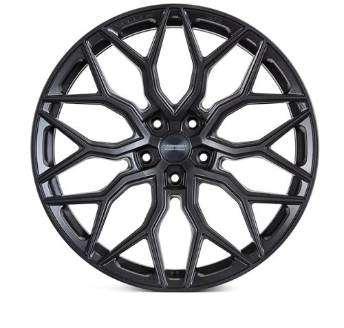 A black, intricately designed alloy wheel with a web-like pattern is displayed against a white background. The center cap reads "VOSSEN FORGED."