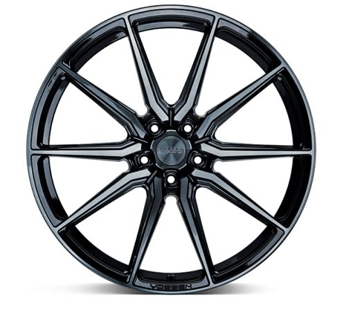 A glossy black alloy wheel features a multi-spoke design, radiating symmetrically from the center hub. "Vossen" is subtly inscribed on the wheel hub and rim edge, against a white background.