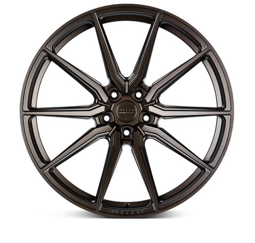 A bronze-colored alloy wheel features multiple slim spokes radiating symmetrically from a central hub. Text includes "VOSSEN" on the bottom spoke and "FORGED" near the center hub.