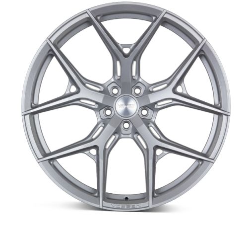 A silver alloy wheel with a complex, multi-spoke design is displayed against a white background. In the center, it features the embossed text: "VOSSEN FORGED."