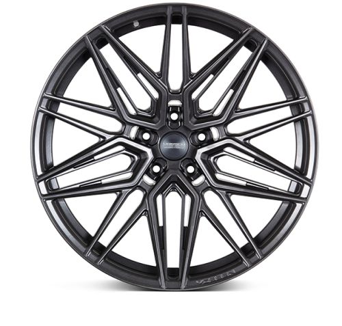 A black, multi-spoke alloy wheel with a starburst design, set against a white background. Center cap text: "VOSSEN FORGED." Rim edge text: "VOSSEN."