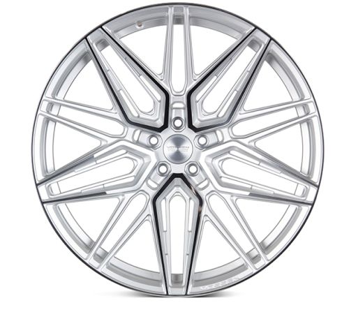 A silver alloy wheel with a geometric, multi-spoke design is displayed against a white background. The center cap reads "VOSSEN FORGED," and "VOSSEN" is engraved on the rim edge.