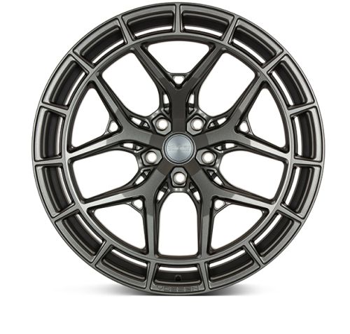 A dark metallic alloy wheel with a multi-spoke design sits against a white background. Central cap reads: "*FORGED HRE WHEELS*."