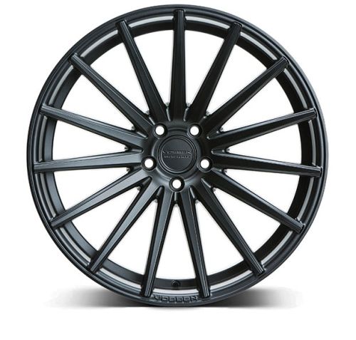 A black alloy wheel with a multi-spoke design, displayed against a white background. Center hub text reads, "VOSSEN FORGED."